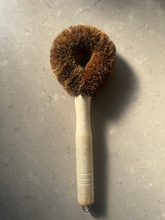 Coconut fibre scrubbing brush